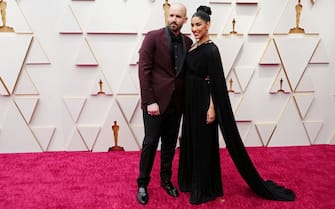 HOLLYWOOD, CALIFORNIA - MARCH 27: (L-R) Brad Hoss and Stephanie Beatriz attend the 94th Annual Academy Awards at Hollywood and Highland on March 27, 2022 in Hollywood, California. (Photo by Jeff Kravitz/FilmMagic)