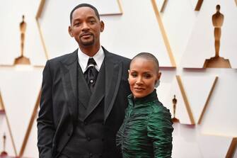 US actor Will Smith(L) and Jada Pinkett Smithattend the 94th Oscars at the Dolby Theatre in Hollywood, California on March 27, 2022. (Photo by Angela WEISS / AFP) / The erroneous mention[s] appearing in the metadata of this photo by Angela WEISS has been modified in AFP systems in the following manner: [Jada Pinkett Smith] instead of [Jada Pink Smith]. Please immediately remove the erroneous mention[s] from all your online services and delete it (them) from your servers. If you have been authorized by AFP to distribute it (them) to third parties, please ensure that the same actions are carried out by them. Failure to promptly comply with these instructions will entail liability on your part for any continued or post notification usage. Therefore we thank you very much for all your attention and prompt action. We are sorry for the inconvenience this notification may cause and remain at your disposal for any further information you may require. (Photo by ANGELA WEISS/AFP via Getty Images)