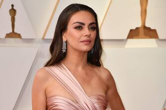 US actress Mila Kunis attends the 94th Oscars at the Dolby Theatre in Hollywood, California on March 27, 2022. (Photo by ANGELA  WEISS / AFP) (Photo by ANGELA  WEISS/AFP via Getty Images)