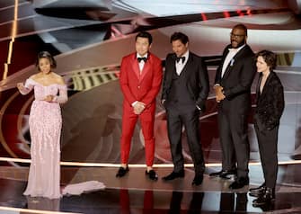 HOLLYWOOD, CALIFORNIA - MARCH 27: (L-R) Co-host Regina Hall, Simu Liu, Bradley Cooper, Tyler Perry, and TimothÃ©e Chalamet are seen onstage during the 94th Annual Academy Awards at Dolby Theatre on March 27, 2022 in Hollywood, California. (Photo by Neilson Barnard/Getty Images)