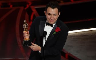Canadian director Ben Proudfoot accepts the award for Best Short Subject Documentary for "The Queen of Basketball" onstage during the 94th Oscars at the Dolby Theatre in Hollywood, California on March 27, 2022. (Photo by Robyn Beck / AFP) (Photo by ROBYN BECK/AFP via Getty Images)