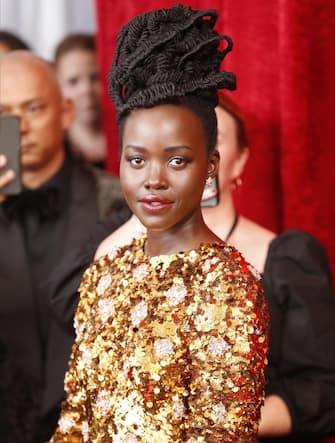 epa09853884 Lupita Nyong'o arrives for the 94th annual Academy Awards ceremony at the Dolby Theatre in Hollywood, Los Angeles, California, USA, 27 March 2022. The Oscars are presented for outstanding individual or collective efforts in filmmaking in 24 categories.  EPA/DAVID SWANSON