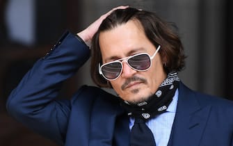 US actor Johnny Depp arrives to attend the sixth day of his libel trial against News Group Newspapers (NGN), at the High Court in London, on July 14, 2020. - Depp is suing the publishers of The Sun and the author of the article for the claims that called him a "wife-beater" in April 2018. (Photo by Daniel LEAL / AFP) (Photo by DANIEL LEAL/AFP via Getty Images)
