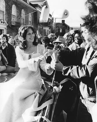 CAMBRIDGE, MA - DECEMBER 1: Linda Lovelace greets fans during a parade in her honor after receiving two awards from The Harvard Lampoon at Harvard Square in Cambridge, Mass. On Dec. 1, 1973. (Photo by Tom Landers / The Boston Globe via Getty Images)