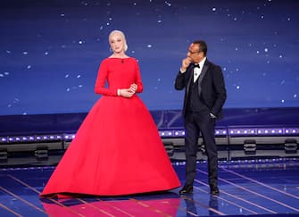 Italian TV host Carlo Conti with Drusilla Foer at Cinecitta' studios during the 67th edition of the David di Donatello Awards, in Rome, Italy, 3 May 2022. ANSA/GIUSEPPE LAMI