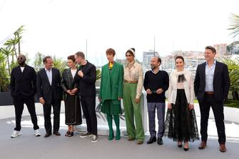 CANNES, FRANCE - MAY 17: (L to R) Ladj Ly, Vincent Lindon, Jasmine Trinca, Joachim Trier, Rebecca Hall, Deepika Padukone, Asghar Farhadi, Noomi Rapace and Jeff Nichols attend the photocall for the Jury during the 75th annual Cannes film festival at Palais des Festivals on May 17, 2022 in Cannes, France. (Photo by John Phillips/Getty Images)