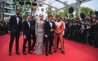 CANNES, FRANCE - MAY 18: Jay Ellis, Danny Ramirez, Jennifer Connelly, Tom Cruise and Glen Powell attend the screening of "Top Gun: Maverick" during the 75th annual Cannes film festival at Palais des Festivals on May 18, 2022 in Cannes, France. (Photo by Stephane Cardinale - Corbis/Corbis via Getty Images)