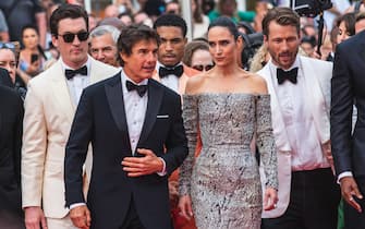 CANNES, FRANCE - MAY 18: Miles Teller, Tom Cruise, Jennifer Connelly and  Glen Powell attend the screening of "Top Gun: Maverick" during the 75th annual Cannes film festival at Palais des Festivals on May 18, 2022 in Cannes, France. (Photo by Stephane Cardinale - Corbis/Corbis via Getty Images)