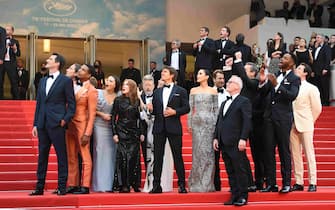 CANNES, FRANCE - MAY 18: Greg Tarzan Davis, Jerry Bruckheimer, Christopher McQuarrie, Miles Teller, Tom Crusie, Glen Powell, Jennifer Connelly, Jon Hamm and Jay Ellis attend the screening of "Top Gun: Maverick" during the 75th annual Cannes film festival at Palais des Festivals on May 18, 2022 in Cannes, France. (Photo by Li Yang/China News Service via Getty Images)