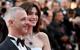 US actor Jeremy Strong (L) and US actress Anne Hathaway pose as they arrive for the screening of the film "Armageddon Time" during the 75th edition of the Cannes Film Festival in Cannes, southern France, on May 19, 2022. (Photo by CHRISTOPHE SIMON / AFP) (Photo by CHRISTOPHE SIMON/AFP via Getty Images)