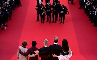 (FromL) Actor Michael Banks Repeta, actor Jaylin Webb, US actor Jeremy Strong, US director James Gray and US actress Anne Hathaway pose as they arrive for the screening of the film "Armageddon Time" during the 75th edition of the Cannes Film Festival in Cannes, southern France, on May 19, 2022. (Photo by Antonin THUILLIER / AFP) (Photo by ANTONIN THUILLIER/AFP via Getty Images)