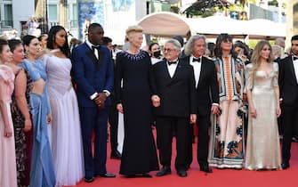 CANNES, FRANCE - MAY 20: Ece Yüksel, Augusta Gore, Burcu Golgedar, Sabrina Elba, Idris Elba, guest, Tilda Swinton, Director George Miller, guest, Margaret Sixel, Zerrin Tekindor and Ogulcan Arman Uslu attend the screening of "Three Thousand Years Of Longing (Trois Mille Ans A T'Attendre)" during the 75th annual Cannes film festival at Palais des Festivals on May 20, 2022 in Cannes, France. (Photo by Dominique Charriau/WireImage)