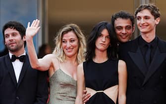 (From L) Actor Baptiste Carrion-Weiss, Italian-French director Valeria Bruni Tedeschi, actress Suzanne Lindon, French actor Sofiane Bennacer and actor Vassili Schneider arrive for the screening of the film "Forever Young (Les Amandiers)" at the 75th edition of the Cannes Film Festival in Cannes, southern France, on May 22, 2022. (Photo by Valery HACHE / AFP) (Photo by VALERY HACHE/AFP via Getty Images)