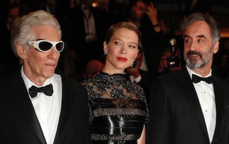 epa09970285 (L-R) Director David Cronenberg, Lea Seydoux, and Don McKellar arrive for the screening of 'Crimes of the Future' during the 75th annual Cannes Film Festival, in Cannes, France, 23 May 2022. The movie is presented in the Official Competition of the festival which runs from 17 to 28 May.  EPA/GUILLAUME HORCAJUELO