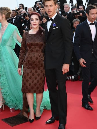 CANNES, FRANCE - MAY 25: Priscilla Presley and Austin Butler attend the screening of "Elvis" during the 75th annual Cannes film festival at Palais des Festivals on May 25, 2022 in Cannes, France. (Photo by Stephane Cardinale - Corbis/Corbis via Getty Images)