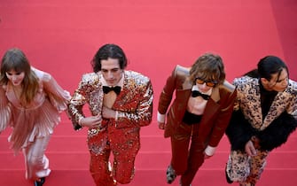( From L) Maneskin rock group members Victoria De Angelis, Damiano David Thomas Raggi,  and Ethan Torchio arrive for the screening of the film "Elvis" during the 75th edition of the Cannes Film Festival in Cannes, southern France, on May 25, 2022. (Photo by Antonin THUILLIER / AFP) (Photo by ANTONIN THUILLIER/AFP via Getty Images)