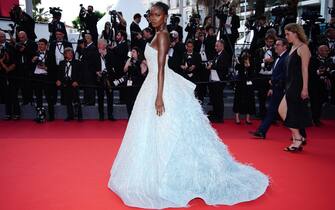 epa09977809 Leomie Anderson arrives for the screening of 'Broker (Les Bonnes Etoiles)' during the 75th annual Cannes Film Festival, in Cannes, France, 26 May 2022. The movie is presented in the Official Competition of the festival which runs from 17 to 28 May.  EPA/CLEMENS BILAN