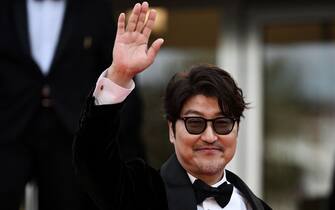 South Korean actor Song Kang-Ho arrives for the screening of the film "Broker" during the 75th edition of the Cannes Film Festival in Cannes, southern France, on May 26, 2022. (Photo by LOIC VENANCE / AFP) (Photo by LOIC VENANCE / AFP via Getty Images)