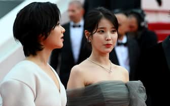 CANNES, FRANCE - MAY 26: Lee Joo-Young and Choi Hee-jin attend the screening of "Broker (Les Bonnes Etoiles)" during the 75th annual Cannes film festival at Palais des Festivals on May 26, 2022 in Cannes, France.  (Photo by Joe Maher / Getty Images)