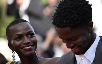 French actress Annabelle Lengronne (L) and Franch-Congolese comedian Stephane Bak arrive for the screening of the film "Mother And Son (Un Petit Frere)" during the 75th edition of the Cannes Film Festival in Cannes, southern France, on May 27, 2022. (Photo by LOIC VENANCE / AFP) (Photo by LOIC VENANCE/AFP via Getty Images)