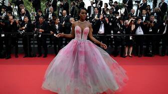 US actress Aja Naomi King arrive for the Closing Ceremony of the 75th edition of the Cannes Film Festival in Cannes, southern France, on May 28, 2022. (Photo by PATRICIA DE MELO MOREIRA / AFP) (Photo by PATRICIA DE MELO MOREIRA/AFP via Getty Images)