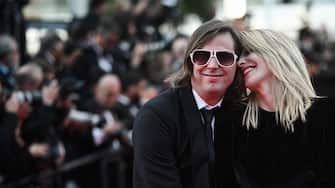 Belgian film director Felix Van Groeningen (L) and Belgian director Charlotte Vandermeersch arrive for the Closing Ceremony of the 75th edition of the Cannes Film Festival in Cannes, southern France, on May 28, 2022. (Photo by LOIC VENANCE / AFP) (Photo by LOIC VENANCE/AFP via Getty Images)
