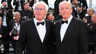 CANNES, FRANCE - MAY 28: (L to R) Jean-Pierre Dardenne and Luc Dardenne attend the closing ceremony red carpet for the 75th annual Cannes film festival at Palais des Festivals on May 28, 2022 in Cannes, France.  (Photo by Stephane Cardinale - Corbis / Corbis via Getty Images)