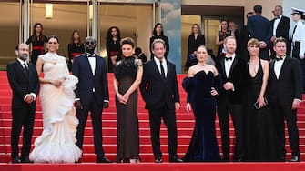 CANNES, FRANCE - MAY 28: (L-R) Jury Member Asghar Farhadi, Jury Member Deepika Padukone, Jury Member Ladj Ly, Jury Member Jasmine Trinca, President of the Jury of the 75th Cannes Film Festival Vincent Lindon, Jury Member Noomi Rapace, Jury Member Joachim Trier, Jury Member Rebecca Hall and Jury Member Jeff Nichols attend the closing ceremony red carpet for the 75th annual Cannes film festival at Palais des Festivals on May 28, 2022 in Cannes, France. (Photo by Stephane Cardinale - Corbis/Corbis via Getty Images)