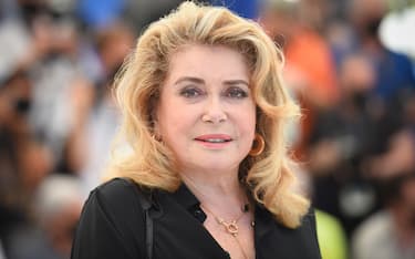 CANNES, FRANCE - JULY 11: Catherine Deneuve attends the "De Son Vivant (Peaceful)" photocall during the 74th annual Cannes Film Festival on July 11, 2021 in Cannes, France. (Photo by Stephane Cardinale - Corbis/Corbis via Getty Images)