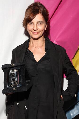 ROME, ITALY - JUNE 20: Laura Morante poses with her Nastro Speciale Award at the 76th Nastri D'Argento 2022 on June 20, 2022 in Rome, Italy. (Photo by Daniele Venturelli/Daniele Venturelli / WireImage  )