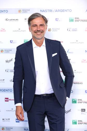 ROME, ITALY - JUNE 20: Beppe Convertini attends the red carpet at the 76th Nastri D'Argento 2022 on June 20, 2022 in Rome, Italy. (Photo by Daniele Venturelli/Daniele Venturelli / WireImage  )