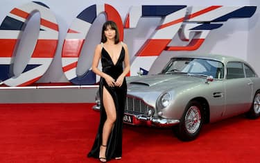 LONDON, ENGLAND - SEPTEMBER 28: Ana De Armas stands next to James Bond Aston Martin Car at the World Premiere of "NO TIME TO DIE" at the Royal Albert Hall on September 28, 2021 in London, England. (Photo by Ian Gavan/Getty Images for EON Productions, Metro-Goldwyn-Mayer Studios, and Universal Pictures)