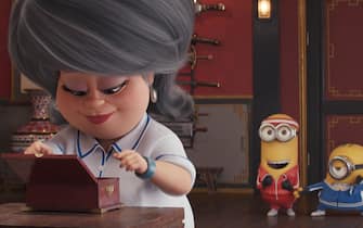 (from left) Master Chow (Michelle Yeoh) and Minions Kevin, Stuart and Bob in Illumination's Minions: The Rise of Gru, directed by Kyle Balda.