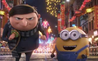 (from left) Gru (Steve Carell) and Minion Otto in Illumination's Minions: The Rise of Gru, directed by Kyle Balda.