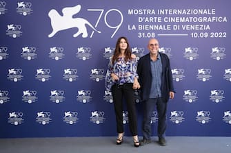 VENICE, ITALY - SEPTEMBER 08: Monica Bellucci and Director Paolo VirzÃ¬ attend the photocall for "SiccitÃ " at the 79th Venice International Film Festival on September 08, 2022 in Venice, Italy. (Photo by Daniele Venturelli/WireImage)