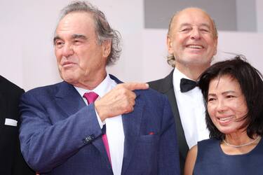 VENICE, ITALY - SEPTEMBER 09: (2ndL-R) Director Oliver Stone, a guest and Sun-jung Jung attend the "Nuclear" red carpet at the 79th Venice International Film Festival on September 09, 2022 in Venice, Italy. (Photo by Daniele Venturelli/WireImage)