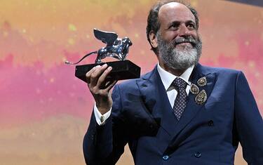 Italian director Luca Guadagnino acknowledges receiving the Silver Lion for Best Director for "Bones And All" on September 10, 2022 during the closing ceremony of the 79th Venice International Film Festival at Lido di Venezia in Venice, Italy. (Photo by Tiziana FABI / AFP) (Photo by TIZIANA FABI/AFP via Getty Images)