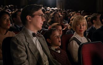 (from left) Burt Fabelman (Paul Dano), younger Sammy Fabelman (Mateo Zoryan Francis-DeFord) and Mitzi Fabelman (Michelle Williams) in The Fabelmans, co-written and directed by Steven Spielberg.
