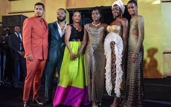 (LR) Mexican actor Tenoch Huerta, US director Ryan Coogler and hi wife Zinzi Evans, Kenyan actor Lupita Nyong'o, US actor Danai Gurira, and Guyanese actor Letitia Wright arrive for the African premiere of the film 