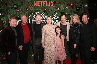 NEW YORK, NEW YORK - NOVEMBER 09: (L-R) Chase Ramsey, Brad Krevoy, Chord Overstreet, Lindsay Lohan, Olivia Perez, George Young, Janeen Damian and Michael Damian attend Netflixâ  s Falling For Christmas Celebratory Holiday Fan Screening with Cast & Crew on November 9, 2022 in New York City (Photo by Bryan Bedder/Getty Images for Netflix)