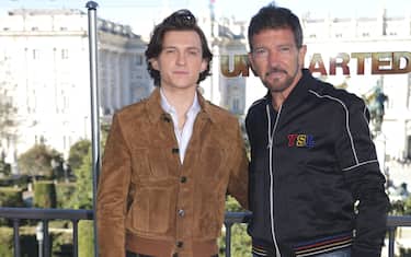 Actors Tom Holland (l) and Antonio Banderas (r), pose at the photocall of the movie 'Uncharted', at the Teatro Real, on February 8, 2022, in Madrid (Spain). The film, an adaptation of the video game series created by Naughty Dog, is a prequel to the saga in which we will discover the details of how the young bounty hunter Nathan Drake (Tom Holland) got to know his mentor and friend Victor Sullivan (Mark Wahlberg). Photo by José Ramón Hernando / Europa Press/ABACAPRESS.COM