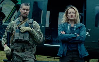 Troll (L to R) Mads Sjøgård Pettersen as Captain Kristoffer Holm, Ine Marie Wilmann as Nora and Kim S. Falck-Jørgensen as Andreas Isaksen in Troll Cr. Courtesy of Netflix © 2022