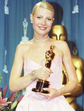 American actress Gwyneth Paltrow with her Best Actress Oscar which she won at the 71st annual Academy Awards for her role in the film Shakespeare in Love. 22/03/02 : The tearful speech from actress Gwyneth Paltrow after winning an Oscar three years ago was named in a survey today, as the most memorable moment at an award ceremony.  Gwyneth Paltrow's emotional acceptance speech in 1999 for best actress in Shakespeare in Love was voted the most unforgettable moment, attracting 13% of the votes.   (Photo by Peter Jordan - PA Images/PA Images via Getty Images)