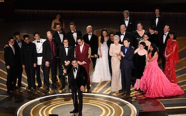 US film producer Jonathan Wang (C) accepts the Oscar for Best Picture for "Everything Everywhere All at Once" onstage during the 95th Annual Academy Awards at the Dolby Theatre in Hollywood, California on March 12, 2023. (Photo by Patrick T. Fallon / AFP) (Photo by PATRICK T. FALLON/AFP via Getty Images)
