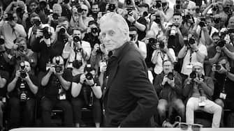 (EDITORS NOTE: Image has been converted to black and white.) Michael Douglas attends a photocall as he receives an honorary Palme D'Or at the 76th annual Cannes film festival at Palais des Festivals on May 16, 2023 in Cannes, France.  (Photo by Stephane Cardinale - Corbis/Corbis via Getty Images)