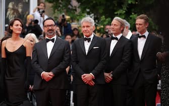 CANNES, FRANCE - MAY 18: Phoebe Waller-Bridge, James Mangold, Harrison Ford and Mads Mikkelsen attend the "Indiana Jones And The Dial Of Destiny" red carpet during the 76th annual Cannes film festival at Palais des Festivals on May 18, 2023 in Cannes, France. (Photo by Mike Coppola/Getty Images)
