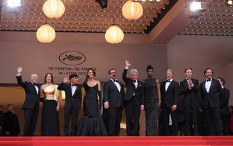 CANNES, FRANCE - MAY 18: (L-R) Producer Frank Marshall, Producer Kathleen Kennedy, Ethann Isidore, Phoebe Waller-Bridge, Director James Mangold, Harrison Ford, Shaunette RenÃ©e Wilson, Boyd Holbrook, Mads Mikkelson and Producer Simon Emanual attend the "Indiana Jones And The Dial Of Destiny" red carpet during the 76th annual Cannes film festival at Palais des Festivals on May 18, 2023 in Cannes, France. (Photo by Mike Coppola/Getty Images)