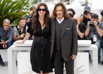 CANNES, FRANCE - MAY 17: MaÃ¯wenn and Johnny Depp attend the "Jeanne du Barry" photocall at the 76th annual Cannes film festival at Palais des Festivals on May 17, 2023 in Cannes, France. (Photo by Samir Hussein/WireImage)