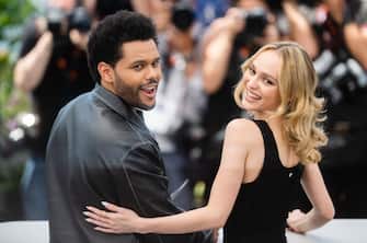 CANNES, FRANCE - MAY 23:  Lily-Rose Depp and Abel 'The Weeknd' Tesfaye (L) attend "The Idol" photocall at the 76th annual Cannes film festival at Palais des Festivals on May 23, 2023 in Cannes, France. (Photo by Samir Hussein/WireImage)