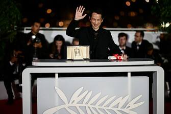 Vietnamese-French director Tran Anh Hung poses during a photocall after he won the Best Director prize for the film "La Passion de Dodin Bouffant" (The Pot-au-Feu) during the closing ceremony of the 76th edition of the Cannes Film Festival in Cannes, southern France, on May 27, 2023. (Photo by LOIC VENANCE / AFP) (Photo by LOIC VENANCE/AFP via Getty Images)